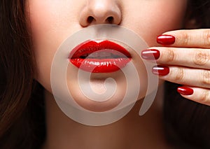 Red Lips and Nails closeup. Open Mouth