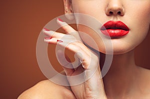 Red Lips and Nails closeup. Open Mouth. Manicure and Makeup. Make up concept.