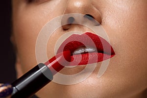 Red Lipstick. Closeup Of Woman Face With Bright Lips Makeup