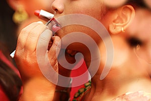 Red Lipstick. Closeup Of Woman Face With Bright Red Matte Lipstick On Lips. Beauty Cosmetics, Makeup Concept.