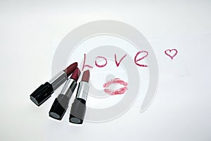 Red lipstick isolated on white background