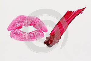 Red lipstick isolated on white background photo