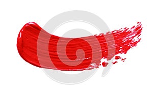 Red lipstick stroke smudge smear isolated on white background. Bright color cream make-up swatch cut out