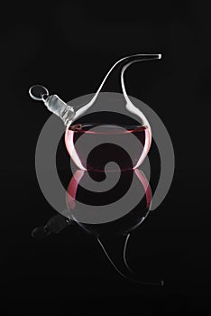 Red liquid in a chemical retort