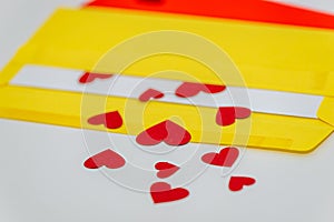 Red little hearts coming out from envelope isolated on white background with copy space, loveletter concept