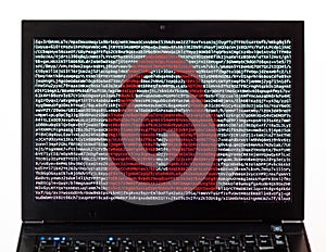 Red lock over encrypted text on a laptop screen against a white