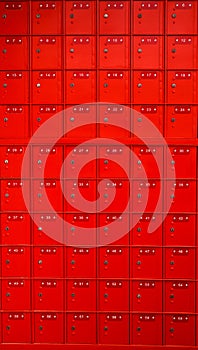Red lockers, keyholes and mailboxes with numbers background