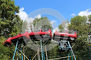 red locomotives ride on the railway attraction