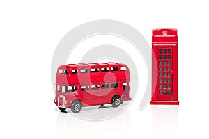 A Red London Doubledecker Bus and red telephone box photo