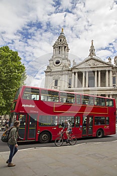 Red London Routemaster bus in front of St Pauls Cathedral, London, England, UK, May 20, 2017