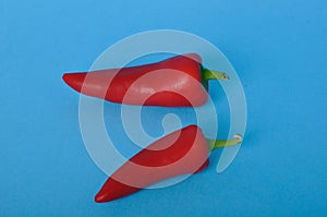 red long pepper on blue bacground