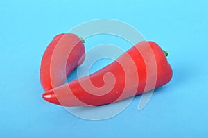 red long pepper on blue bacground