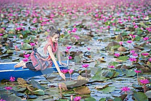 Red lotus sea, Woman in flower lotus lake