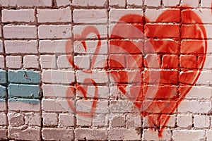 Red Love Heart hand drawn on brick wall grunge textured background trendy street style