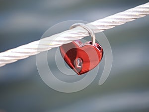 Red love lock in form of a heart