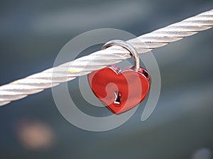 Red love lock in form of a heart