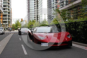 Red luxury Lamborghini car in downtown Vancouver, British Columbia, Canada