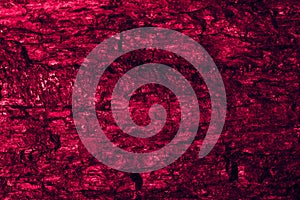 red macro photo of coal, texture background