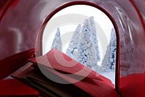 Red mail box filled with letters to santa claus