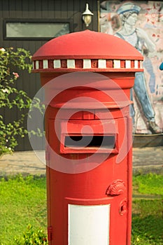 Red mail post box on outdoor location