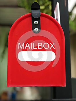 Red Mailbox made by metal. Someone waiting mail from special person