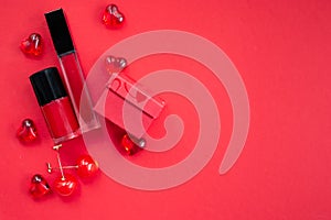 Red make-uo objects on a red background