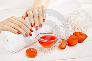 Red manicure with dekor. spa