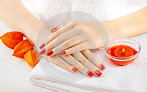 Red manicure with dekor. spa