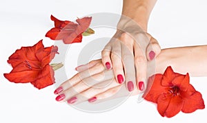 Red manicure and sword lilies