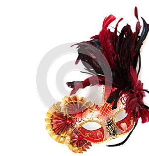 Red mardi gras or venetian mask on a white background