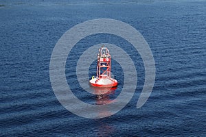 Red maritime navigation buoy