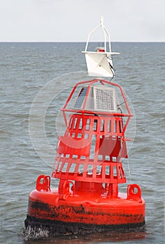 Red Marker Bouy at Sea