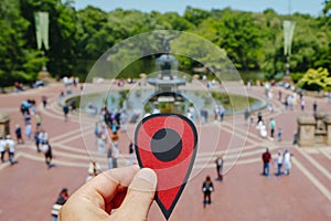 red marker points Bethesda Terrace in Central Park