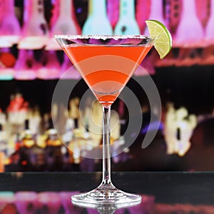 Red Martini Cocktail drink in a bar or disco