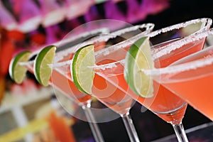 Red Martini Cocktails in glasses in a bar