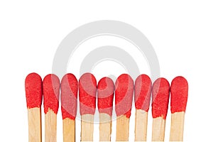 Red match sticks heads isolated on white