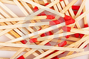 Red match sticks on white background