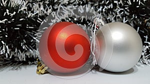 Red matte christmas ball decoration with a silver ball decoration