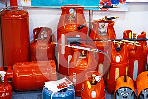 Red metal cylinders for propane gas