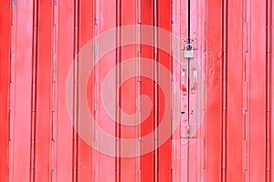Red metal sheet folding door was locked with padlock
