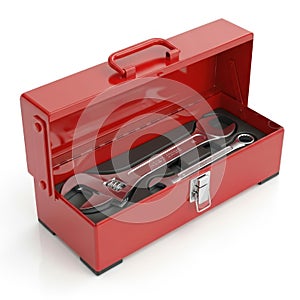 Red metal toolbox filled with assorted wrenches isolated on white background