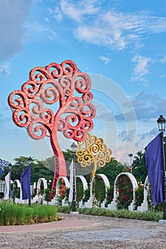 Red metal tree