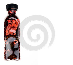 Red metallic valentine hears in small square bottle love and relationship designs