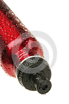 Red metallic water bottle with water droplets