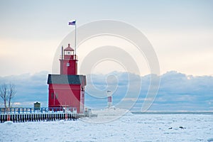 Red Michigan lighthouse in winter