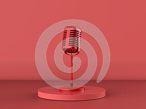 Red microphone on stage with red background