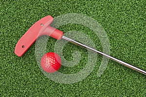 Red Mini Golf Putter and Ball photo