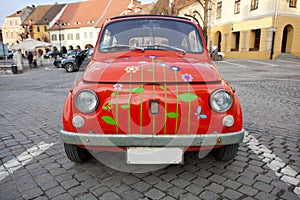 Red mini vintage car; Red Bug