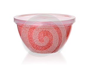 Red modeling foam beads clay in plastic container