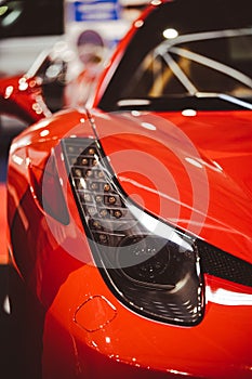 Red modern exotic sports car LED headlights